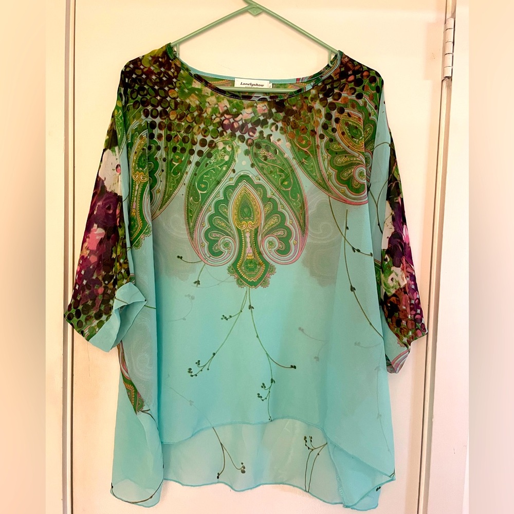 Beautiful sheer flowy top. Size Large.